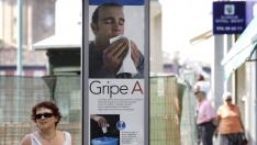 Cartel para la prevención de la grip A en una calle de Zaragoza en septiembre de 2009.