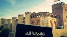 La Guardia Civil descubrió que el investigado había subido esta fotografía de la bandera de Dáesh con el palacio de La Aljafería detrás.