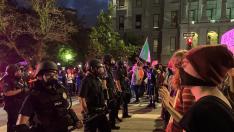 Demonstrators face off with police near Capitol building in Denver, Colorado