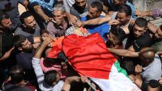 Un entierro de un joven muerto por los disparos de soldados israelíes.