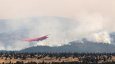 Firefighters deal with extreme conditions as Bootleg Fire expands, in Oregon