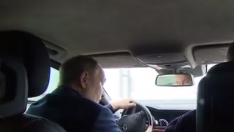Putin conduciendo por el puente de Crimea