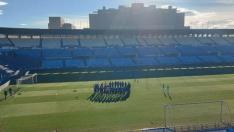 La plantilla del Real Zaragoza, al inicio del entrenamiento de este jueves.