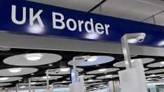 Área de control de pasaportes de la Terminal 5, en el aeropuerto de Heathrow, Londres.