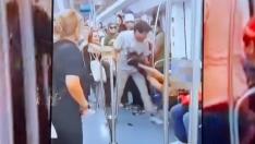 Captura de un vídeo en redes sociales de la agresión de un hombre a una mujer trans en la línea 1 del Metro de Barcelona.