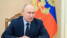 Russian President Vladimir Putin chairs a meeting with members of the Security Council in Moscow