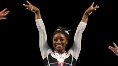 Simone Biles poses during the awards ceremony after winning the all-around of the Core Hydration Classic