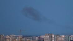 Smoke rises in the sky over the city after a Russian missile strike in Kyiv