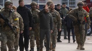 Ukraine’s President Zelenskiy arrives for a flag rising in central Kherson