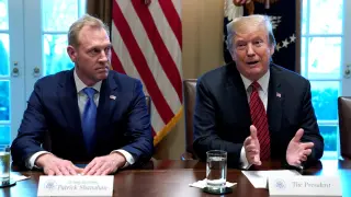 FILE PHOTO: Acting Defense Secretary Patrick Shanahan  (L) listens as U.S. President Donald Trump holds a meeting with senior military leaders at the White House in Washington, U.S., April 3, 2019.  REUTERS/Kevin Lamarque/File Photo [[[REUTERS VOCENTO]]] USA-TRUMP/SHANAHAN