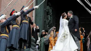 St. Petersburg (Russian Federation), 01/10/2021.- Grand Duke of Russia George Mikhailovich Romanov (R) kisses his bride Victoria Romanovna Bettarini (L) on the church's stairs as they leave their wedding ceremony at the St. Isaac's Cathedral in St. Petersburg, Russia, 01 October 2021. George Mikhailovich Romanov is a descendant of the Romanov family through his mother, recognized by a part of the monarchists (Cyrilists) as the heir to the supremacy in the Russian Imperial House. (Rusia, San Petersburgo) EFE/EPA/ANATOLY MALTSEV BEST QUALITY AVAILABLE
 RUSSIA ROMANOV WEDDING