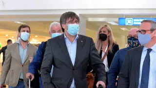 Puigdemont arrives at Alghero airport