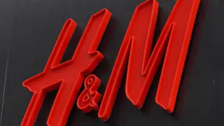 FILE PHOTO: The logo of fashion retailer H&M is on display outside a store in Stockholm, Sweden, July 17, 2023. REUTERS/Tom Little/File Photo