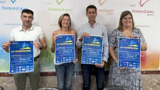 Cristian Carpi, Isabel Lisa, Saúl Pérez y Pilar Lleyda con el cartel de la prueba.
