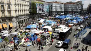 Acampada en la plaza de la Puerta del Sol de Madrid, este mediodía