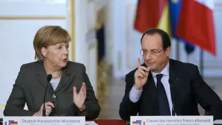 Merkel y Hollande, durante el encuentro de este miércoles