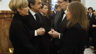 Zapatero y Rajoy, junto a sus respectivas esposas