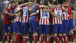 Los jugadores del Atlético celebran la clasificación