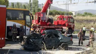 Los dos ocupantes de un turismo fallecen al chocar con un autocar en Alcover