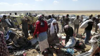 Refugiados sirios, en la frontera con Turquía, huyendo del Estado Islámico