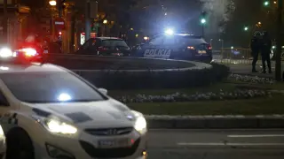 Un coche de Policía, en la calle de Génova de Madrid