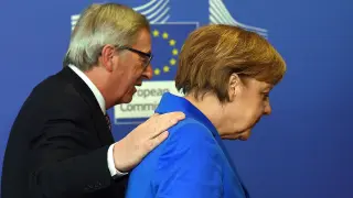 ​Merkel y Juncker urgen a poner fin al conflicto de Ucrania