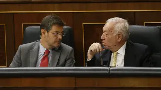 Los ministros de Justicia, Rafael Catalá (i) y Exteriores, José Manuel García-Margallo.