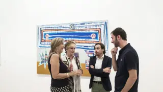 Ignacio Escuín, y Cristina Marín, junto a Remíerz de Ganuza en la presentación de la exposición.