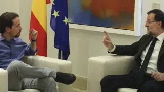 Mariano Rajoy y Pablo Iglesias durante su encuentro.