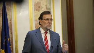 El candidato del PP a la Presidencia del Gobierno, Mariano Rajoy, ayer en una rueda de prensa en el Congreso.