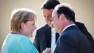 Los tres líderes reunidos en Italia.