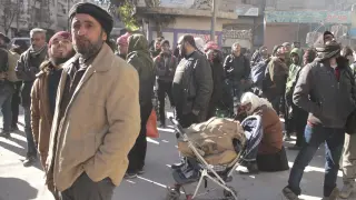 Civiles evacuados del este de Alepo.
