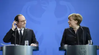 Holande y Merkel este viernes en Berlín.