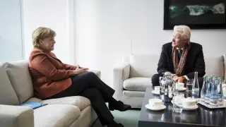 La canciller alemana Angela Merkel y el actor estadounidense Richard Gere.