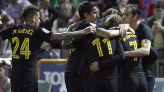 Los jugadores del Atlético celebran un gol ante el Granada.