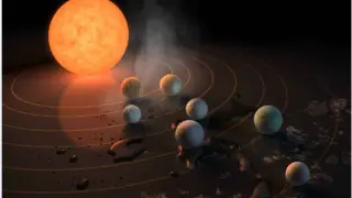 Representación artística del sistema planetario de Trappist-1 recientemente descubierto por un equipo liderado por astrónomos de la Universidad de Lieja, con la colaboración de telescopios de ESO y NASA