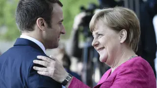 Macron y Merkel en una reunión.