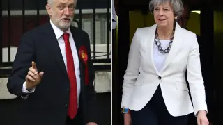 Corbyn y May al acudir a votar este jueves.