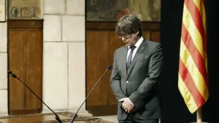 El presidente de la Generalitat, Carles Puigdemont, durante la toma de posesión de Santi Vila como nuevo conseller de Empresa