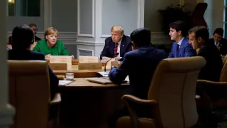 Merkel y Trump, junto a otros líderes, durante la cumbre