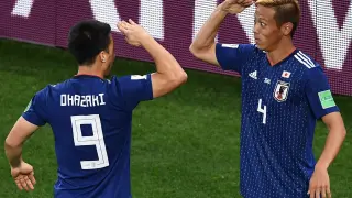 Los japoneses celebran uno de sus goles.