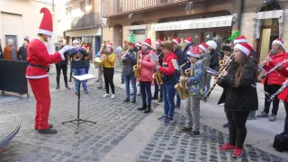 Los villancicos de la A.M. Banda de Tarazona contagian la alegría navideña en Nochebuena