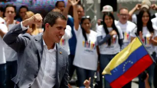 FILE PHOTO: Venezuelan opposition leader Juan Guaido, who many nations have recognised as the country's rightful interim ruler, gestures during a swearing-in ceremony for supporters in Caracas, Venezuela April 27, 2019. REUTERS/Carlos Garcia Rawlins/File Photo [[[REUTERS VOCENTO]]] VENEZUELA-POLITICS/