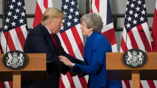 Britain's Prime Minister Theresa May and U.S. President Donald Trump attend a joint news conference at the Foreign & Commonwealth Office, in London, Britain June 4, 2019. David Rose/Pool via REUTERS [[[REUTERS VOCENTO]]] USA-TRUMP/BRITAIN