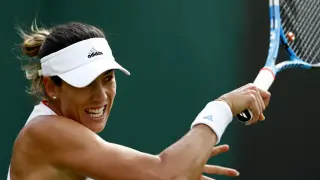 Muguruza, en acción en su debut en Wimbledon 2019