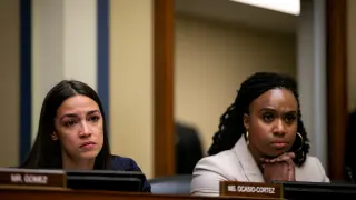 FILE PHOTO: Rep. Alexandria Ocasio-Cortez (D-NY) and Rep. Ayanna Pressley (D-MA) listen as Yazmin Juarez, mother of 19-month-old Mariee, who died after detention by U.S. Immigration and Customs Enforcement (ICE) testifies during a House Oversight Subcommittee on Civil Rights and Human Services hearing titled, "Kids in Cages: Inhumane Treatment at the Border" in Washington, U.S. July 10, 2019. REUTERS/Al Drago/File Photo [[[REUTERS VOCENTO]]] USA-TRUMP/DEMOCRATS