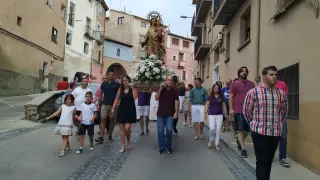 La Virgen recorre las calles del barrio de La Almehora.