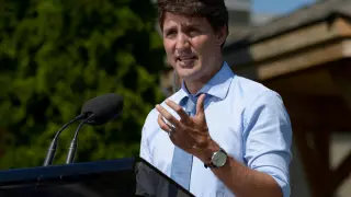 FILE PHOTO: Canada's Prime Minister Justin Trudeau speaks about a watchdog's report that he breached ethics rules by trying to influence a corporate legal case, at the Niagara-on-the Lake Community Centre in Niagara-on-the-Lake, Ontario, Canada, August 14, 2019. REUTERS/Andrej Ivanov/File Photo [[[REUTERS VOCENTO]]] CANADA-POLITICS/TRUDEAU