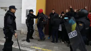 Police officers identify members of Catalan protest group Democratic Tsunami in Salt, near Girona, Spain November 13, 2019. REUTERS/Rafael Marchante [[[REUTERS VOCENTO]]] SPAIN-POLITICS/CATALONIA