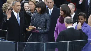 Michelle Obama, con un abrigo de Thom Browne, en la toma de posesión de su marido como presidente de los Estados Unidos en 2013